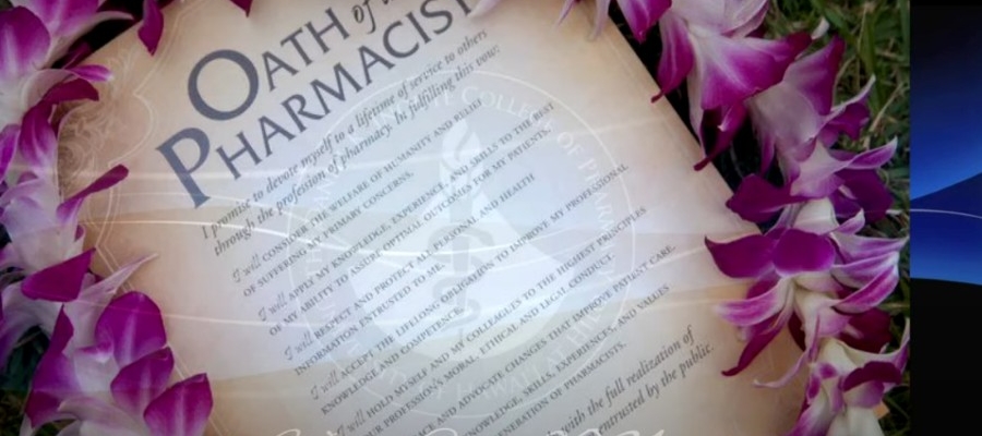 Oath of the Pharmacist scroll surrounded by a lei