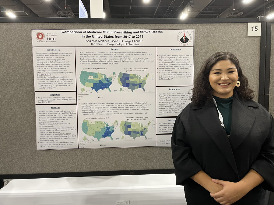 P4 Analeslie Martinez poses by her poster at the ASHP Midyear Meeting.