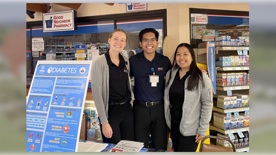 DKICP students Charlotte Powell, Nielsen Gazo and Akiho Uno helped staff a recent health screening event at the Waimea KTA Pharmacy.